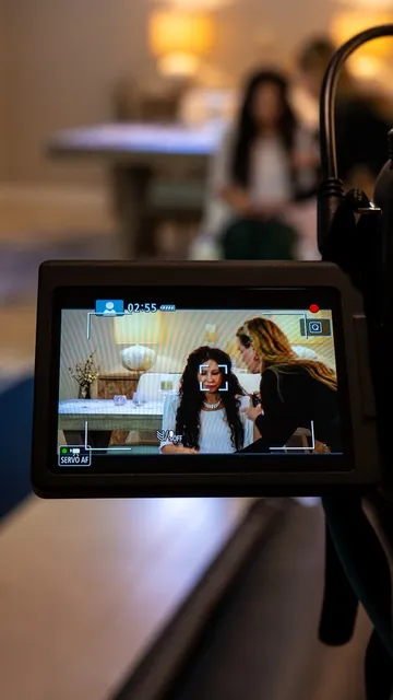 Camera monitor showing an interview setup